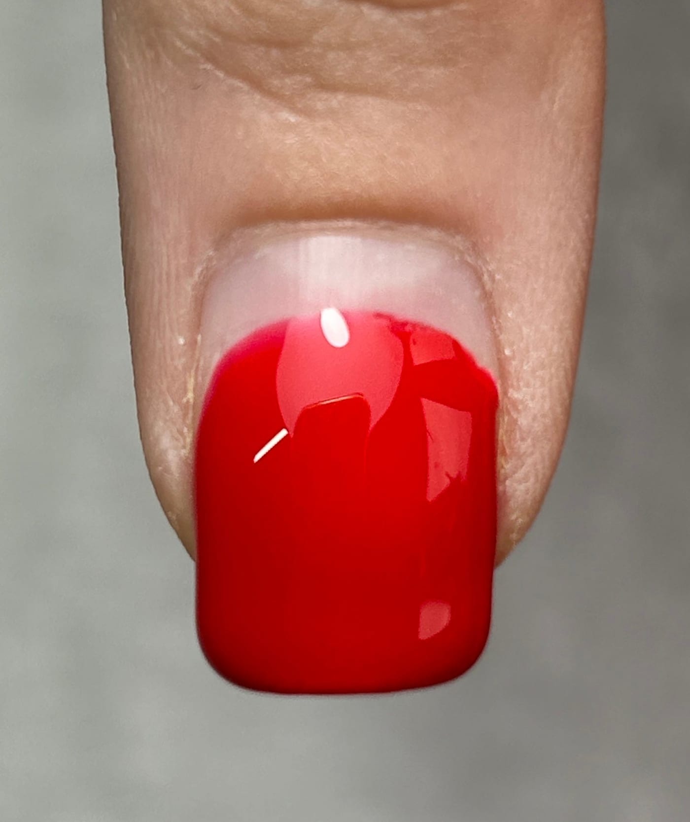 Close-up of glossy gel polish on a fingernail