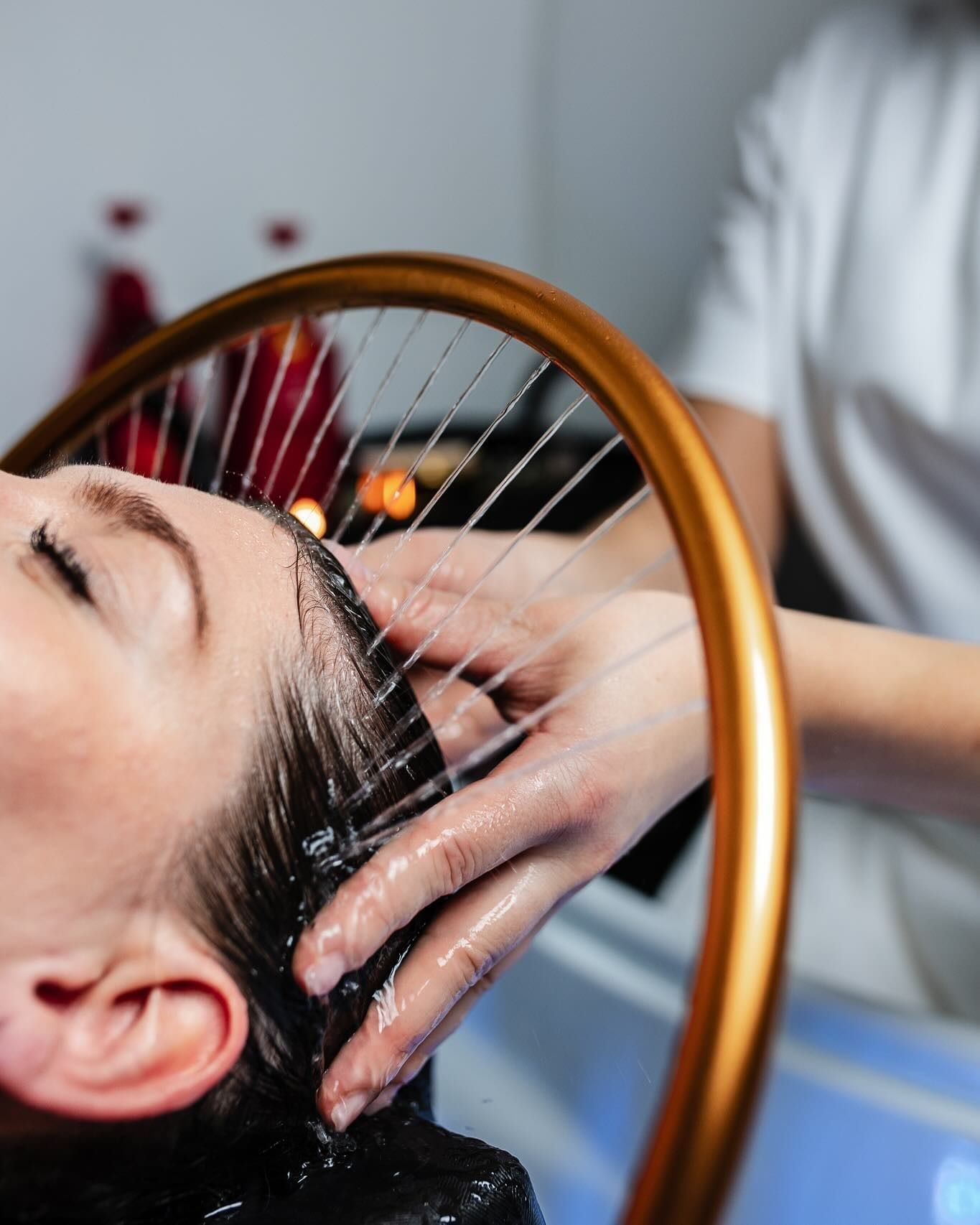 Relaxing professional hair spa treatment at a salon wash station Relaxing professional hair spa treatment at a salon wash station