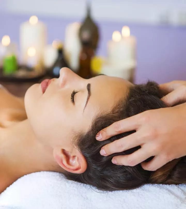 Client receiving a relaxing scalp and head massage at a salon Client receiving a relaxing scalp and head massage at a salon